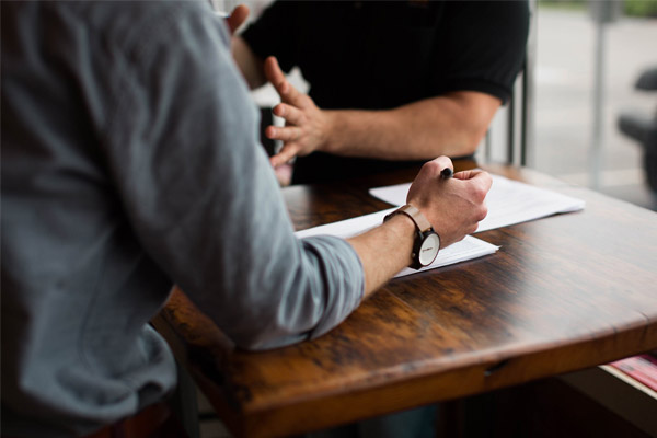 two-men-talking-business-interview